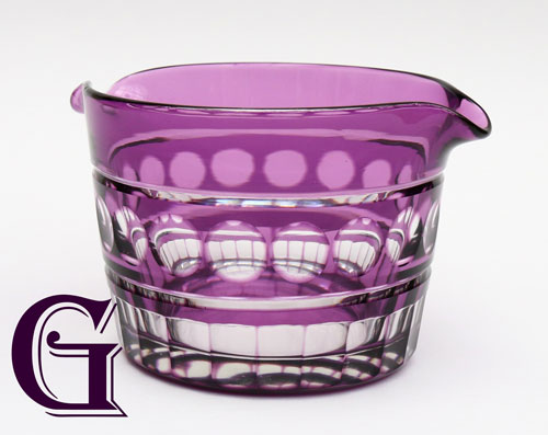 An amethyst cut glass wine rinser