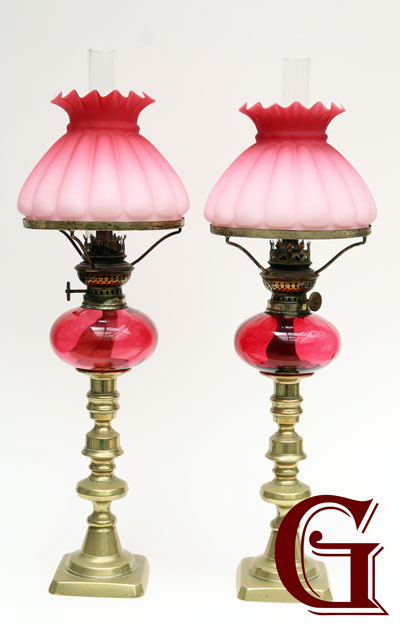 PAIR OF PEG LAMPS WITH PINK SATIN AND CRANBERRY GLASS SHADES