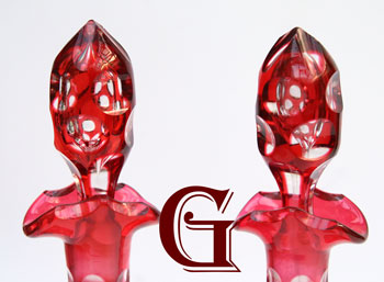 pair of cranberry hock decanters optic cut