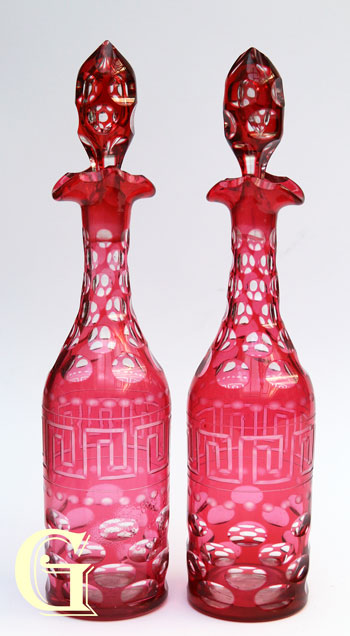 pair of cranberry hock decanters optic cut
