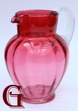 cranberry glass jug with reeded handle