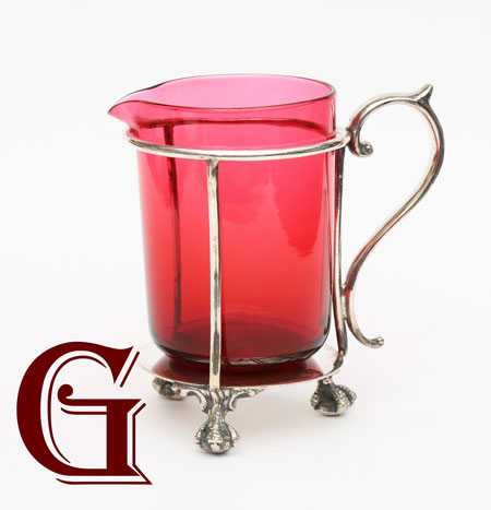 Cranberry glass milk jug EPNS stand