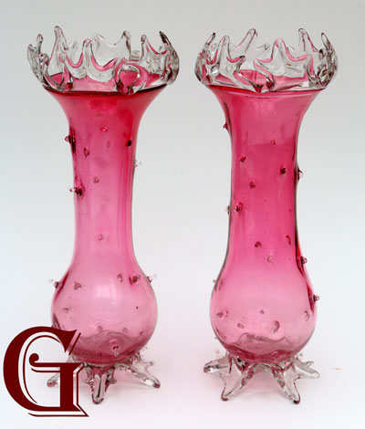 A PRETTY PAIR OF CRYSTAL TOP CRANBERRY VASES